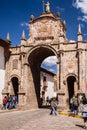 A bustling day at CuscoÃ¢â¬â¢s Arco Santa Clara Royalty Free Stock Photo